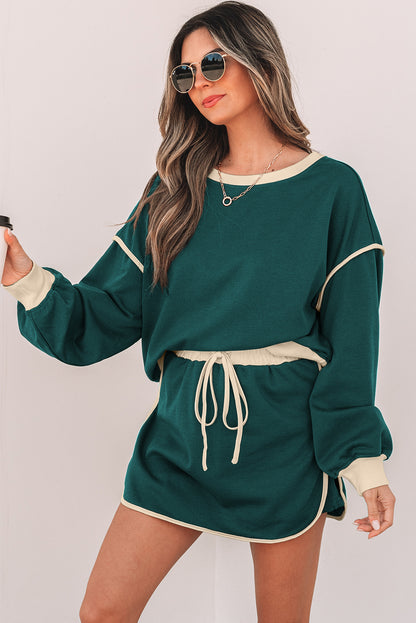 Evergreen Color Contrast Loose Pullover and Lace-up Waist Skort Set